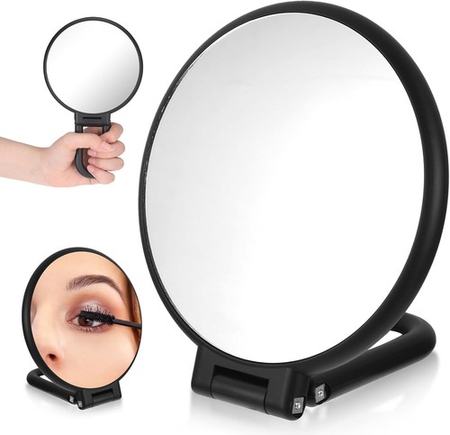 Magnifying mirror hand - magnifying,