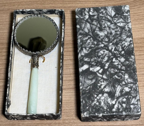 Small decorative hand - hand, mirror
